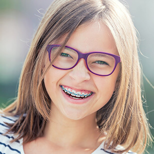 smiling girl with braces